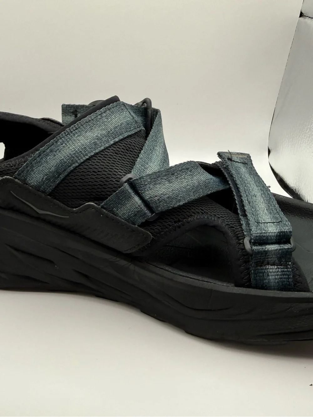 Hoka men’s infini Casual Strappy Sport Sandals in Black with Blue Straps